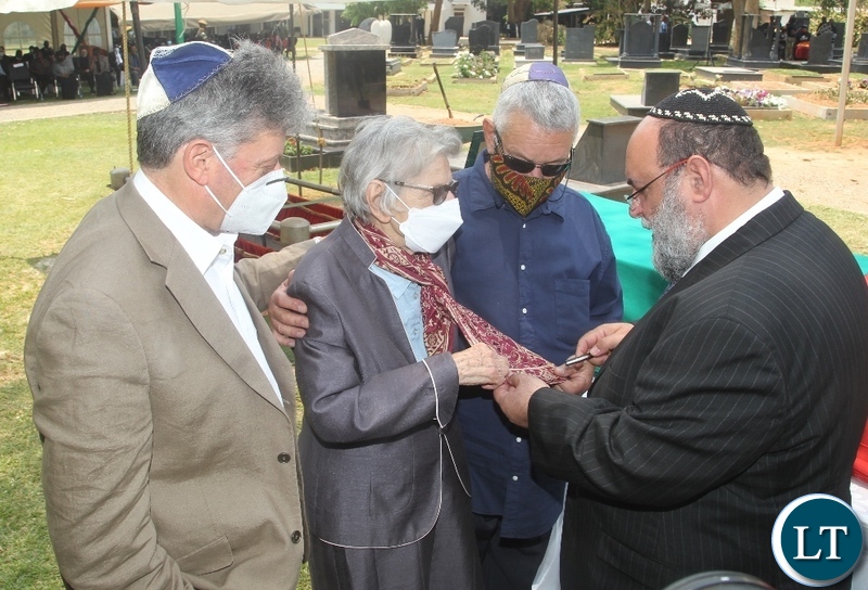 THE Widow, Sara Zukas being consoles by Rabbis Silberhaft(r) and the son David Zukas(L) and Jewish members at the burial and Funeral Service of Late former Cabinet Minister Hon. Simon Ber Zukas in Lusaka.