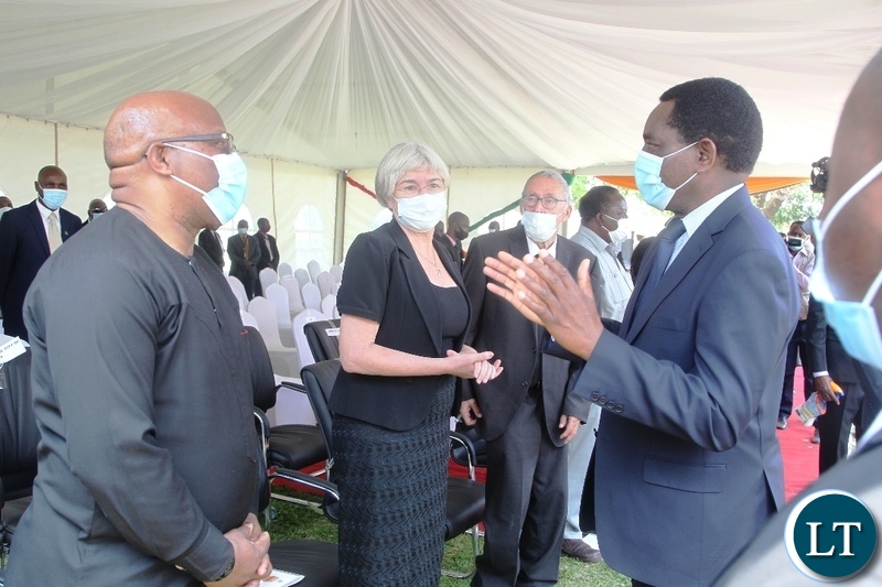 PRESIDENT Hakainde Hichilema confers with former Vice-President Nevers Mumba during the burial and Funeral Service of Late former Cabinet Minister Hon. Simon Ber Zukas in Lusaka