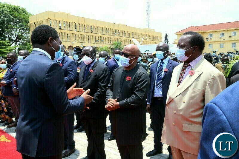 President Hakainde Hichilema confers with Former Vice Presidents Nevers Mumba and Enock Kavindela during the remembrance day of the first World War at the Cenotaph in Lusaka yesterday. Sunday, November 14, 2021. Picture by ROYD SIBAJENE/ZANIS