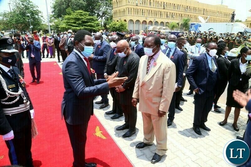 President Hakainde Hichilema confers with Former Vice Presidents Nevers Mumba and Enock Kavindela during the remembrance day of the first World War at the Cenotaph in Lusaka yesterday. Sunday, November 14, 2021. Picture by ROYD SIBAJENE/ZANIS