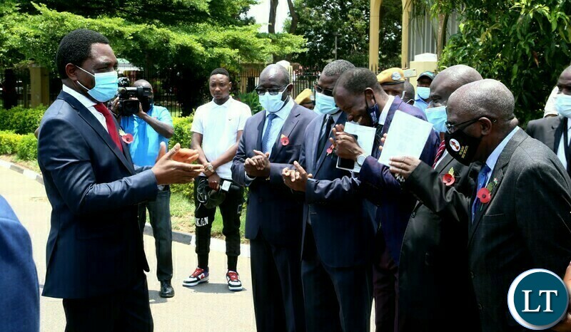 President Hakainde Hichilema interacts Permanent Secretaries after layiing wreaths during the remembrance day of the first World War at the Cenotaph in Lusaka yesterday. Sunday, November 14, 2021. Picture by ROYD SIBAJENE/ZANIS