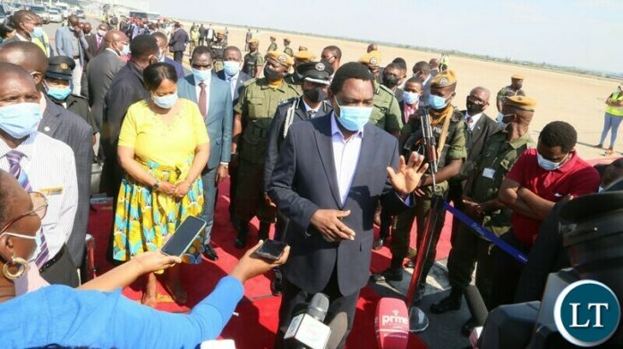 President Hakainde speaking to journalists on his arrival back home from United Kingdom for COP26 summit at Kenneth Kaunda International Airport President Hakainde speaking to journalists on his arrival back home from United Kingdom for COP26 summit at Kenneth Kaunda International Airport
