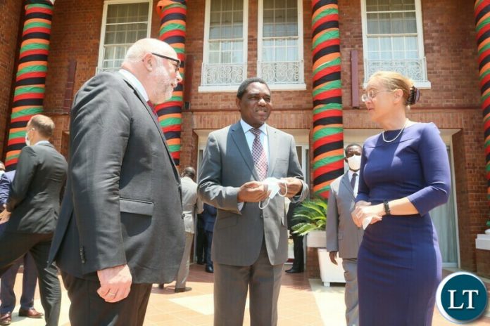 President Hakainde Hichilema confers with the Germany special envoy of the chancellor Gunter Nooke and and Germany Ambassador to Zambia Anne Wagner-Mitchel shortly after the meeting at State House President Hakainde Hichilema confers with the Germany special envoy of the chancellor Gunter Nooke and and Germany Ambassador to Zambia Anne Wagner-Mitchel shortly after the meeting at State House