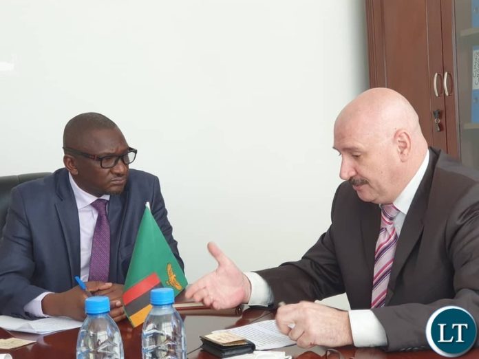 Green Economy and Environment Minister, Hon. Collins Nzovu with the Chargé d'Affaires ad interim at the Embassy of the Russian Federation in Zambia, Mr. Dmitry Yudin Green Economy and Environment Minister, Hon. Collins Nzovu with the Chargé d'Affaires ad interim at the Embassy of the Russian Federation in Zambia, Mr. Dmitry Yudin
