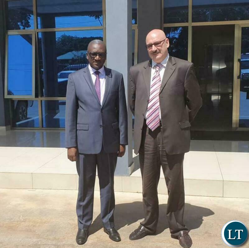 Green Economy and Environment Minister, Hon. Collins Nzovu with the Chargé d'Affaires ad interim at the Embassy of the Russian Federation in Zambia, Mr. Dmitry Yudin