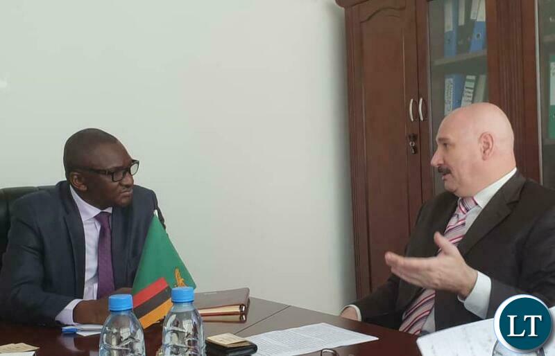 Green Economy and Environment Minister, Hon. Collins Nzovu with the Chargé d'Affaires ad interim at the Embassy of the Russian Federation in Zambia, Mr. Dmitry Yudin