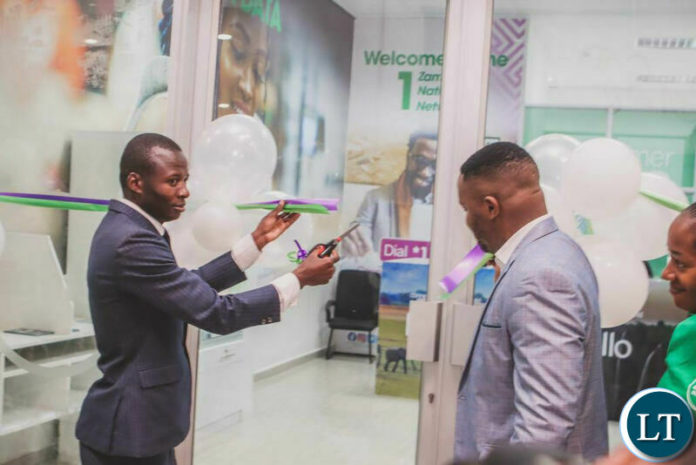 Kalingalinga Ward 36 Councillor Mukubesa Nyoni cuts the ribbon to officially open the Zamtel Kamloops Customer Service Centre Kalingalinga Ward 36 Councillor Mukubesa Nyoni cuts the ribbon to officially open the Zamtel Kamloops Customer Service Centre