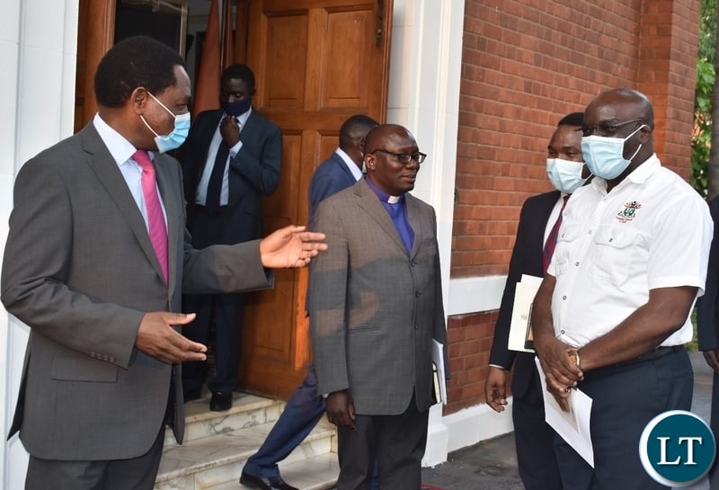 PRESIDENT Hakainde Hichilema confers Presiding  Bishop,Paul Mususu after the clergy paid courtesy call on him at State House .