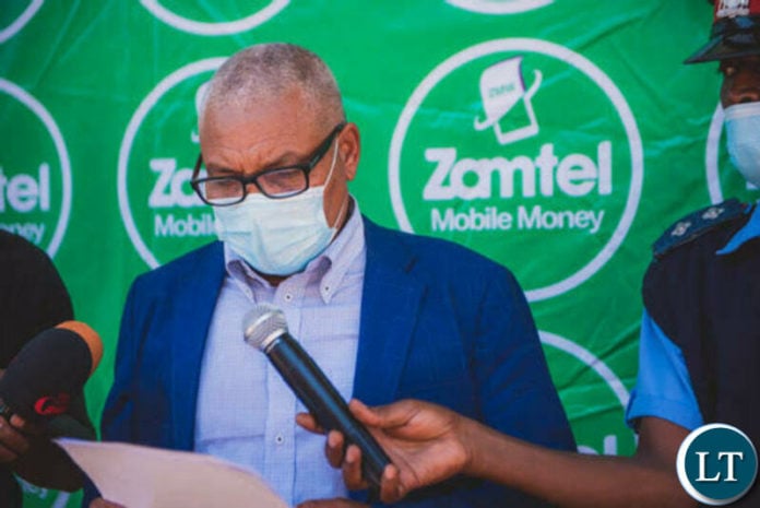Chongwe District Commissioner Dr Evans Lupiya speaking during the official opening of a Zamtel Customer Service Centre at Waterfalls Mall in Chongwe Chongwe District Commissioner Dr Evans Lupiya speaking during the official opening of a Zamtel Customer Service Centre at Waterfalls Mall in Chongwe