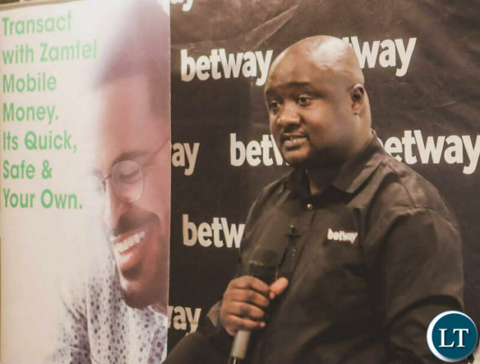 Betway Zambia Head of Marketing and Trade Desmond Kalenga speaking during the launch of a partnership with Zamtel Betway Zambia Head of Marketing and Trade Desmond Kalenga speaking during the launch of a partnership with Zamtel