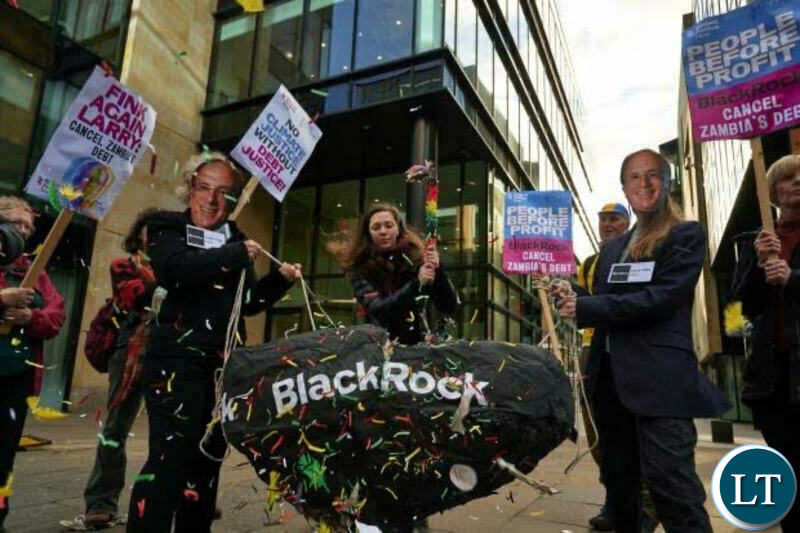 Protesters outside of Blackrock’s Edinburgh office to demanding that the company cancels Zambia's debt.