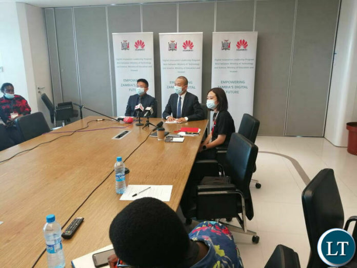 Huawei officials addressing Journalists at a media round table in Lusaka