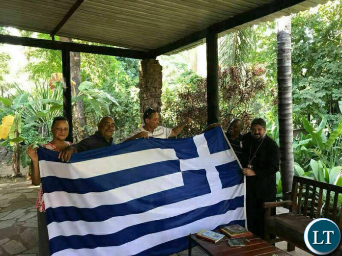 Metropolitan Ioannis (far right) with some of the descendants of the Vlahakis tribe in Zambia. Credit: Facebook-Metropolis of Zambia