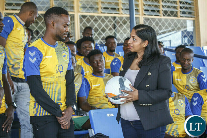 KCM Provisional Liquidator Celine Nair confers with Captain Emmanuel Mathotho