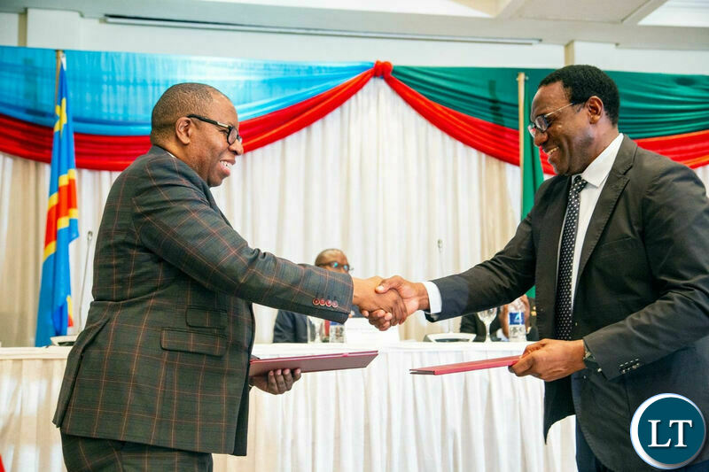 ZESCO Limited Managing Director Eng: Victor Mapani signing the Inter-utility document3.