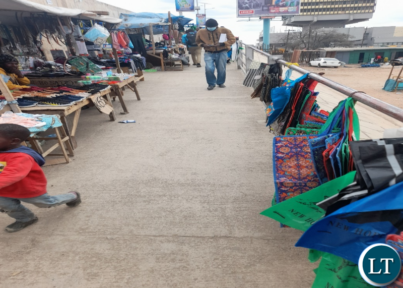Vendors selling all sorts of goods and services right in the CBD and main roads.