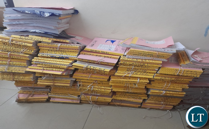 Part of the filing at National Registration Card Office: Seen here is important records slumped on the floor. Are our records safe, I wonder?