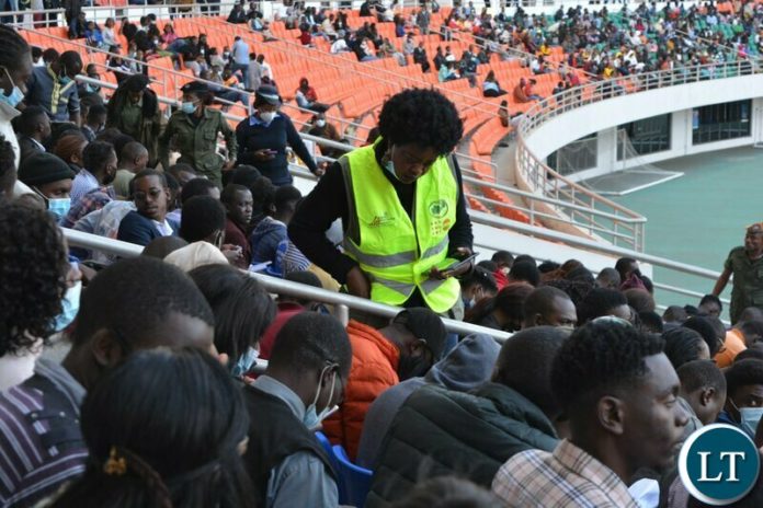 Prospective Census Counters Writing Census Aptitude test in a Stadium