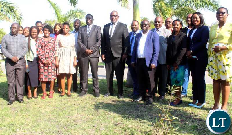 MGEE PS John Msimuko, Smart Zambia National coordinator Percy Chinyama with MGEE and SZI staff