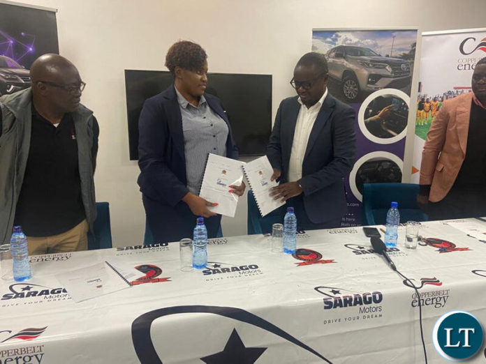 Sarago Motors Chief Operating Officer Luonde Kyanamina with Power Dynamos Chairman Alpha Mwale after signing the shirt sponsorship deal