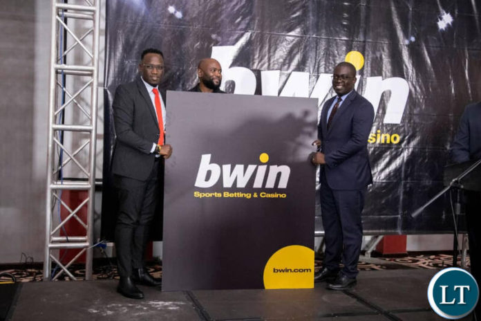 Commerce, Trade and Industry Minister Chipoka Mulenga unveils the bwin brand in Lusaka