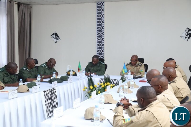 uvenal Marizamunda, Rwanda Correctional Services Commissioner General, and his Zambia counterpart Frederick Chilukutu during a meeting in Kigali on November 28.